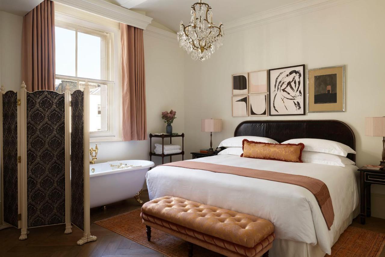 Nomad London酒店 外观 照片 A bedroom at the Hotel George Washington